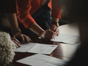 Property lawyer Costa del Sol reviewing a purchase contract with a client